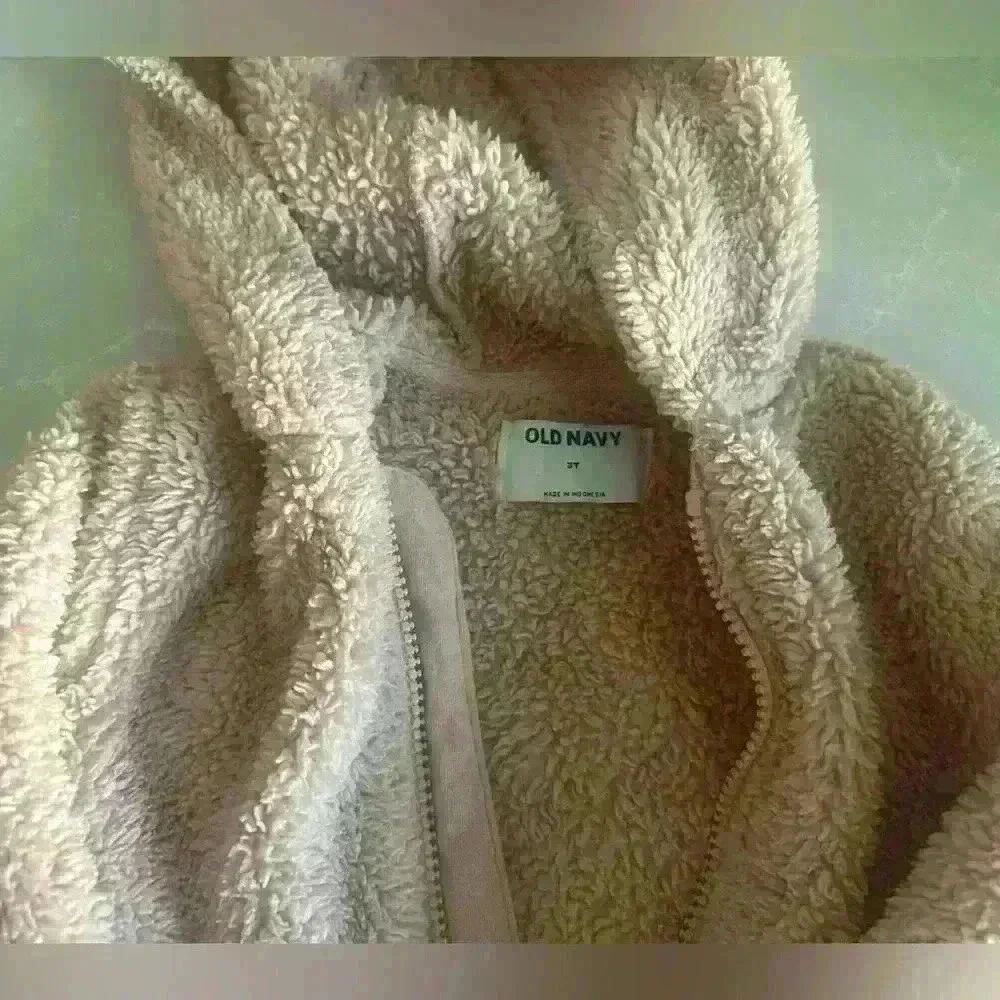 Pink cozy jacket for toddlers.